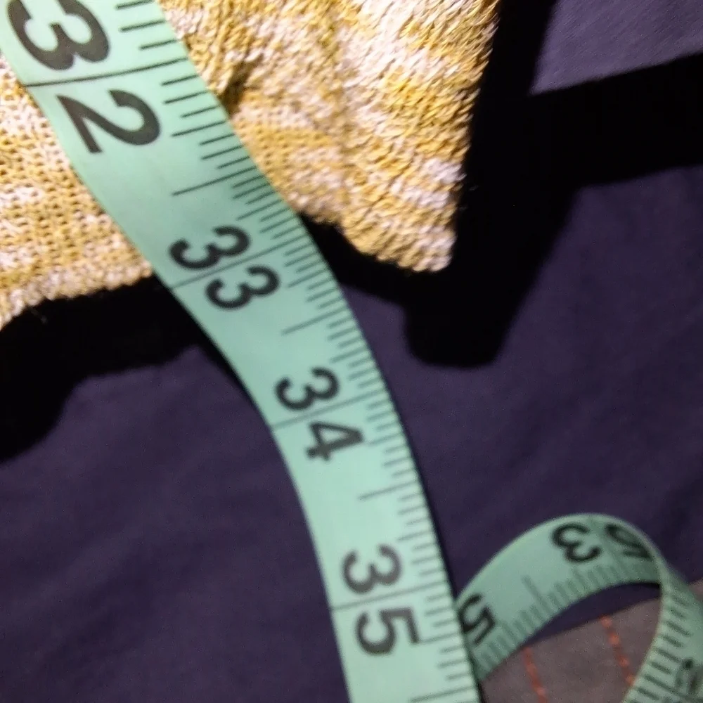 A Free People long length semi-sheer cardigan in a ladies' size XS. EUC.